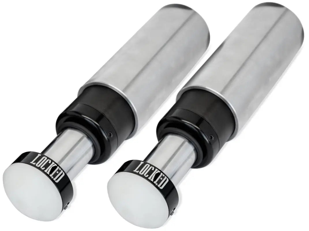 Pair of 2.5' bump stops with threaded pin sleeves, designed for off-road durability and 360° coverage in suspension systems.