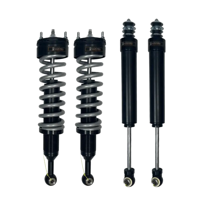 Toyota Tacoma shock package featuring 2.5-inch IFP coilovers and rear shocks. Adjustable, bolt-on design for off-road performance.