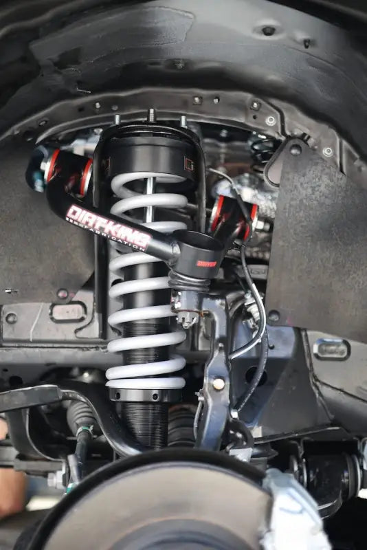 Installed Toyota Tacoma 2.5-inch IFP coilover shock showcasing enhanced suspension setup for improved off-road handling.