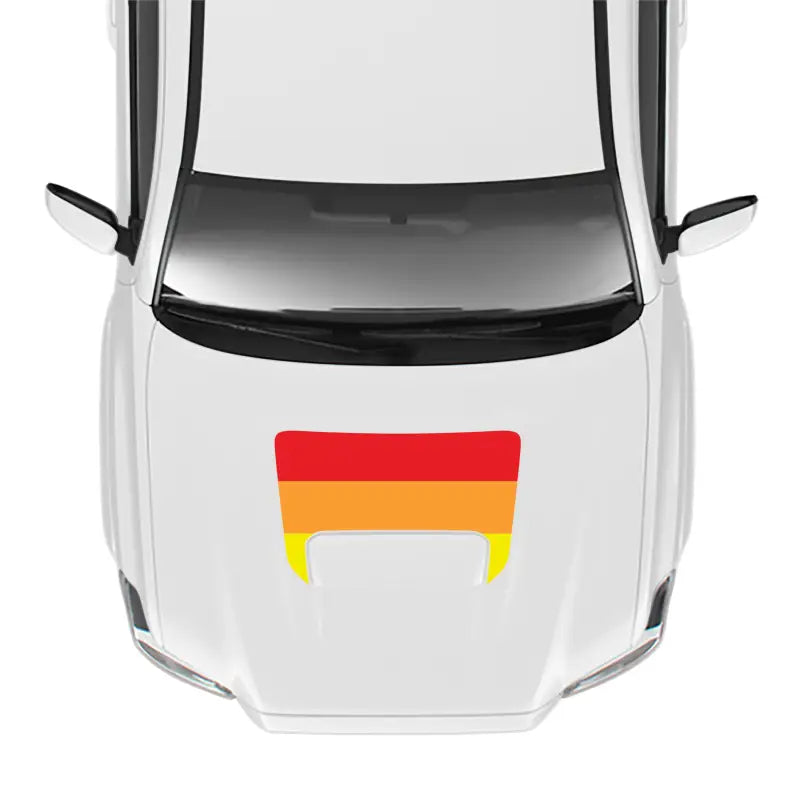 White car with colorful hood decal featuring the 2016-23 Tacoma Pro Sport Hood Stamp