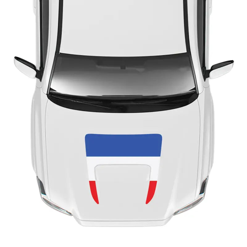 White car with blue, white, and red stripes showcasing the 2016-23 Tacoma Sport Hood Stamp