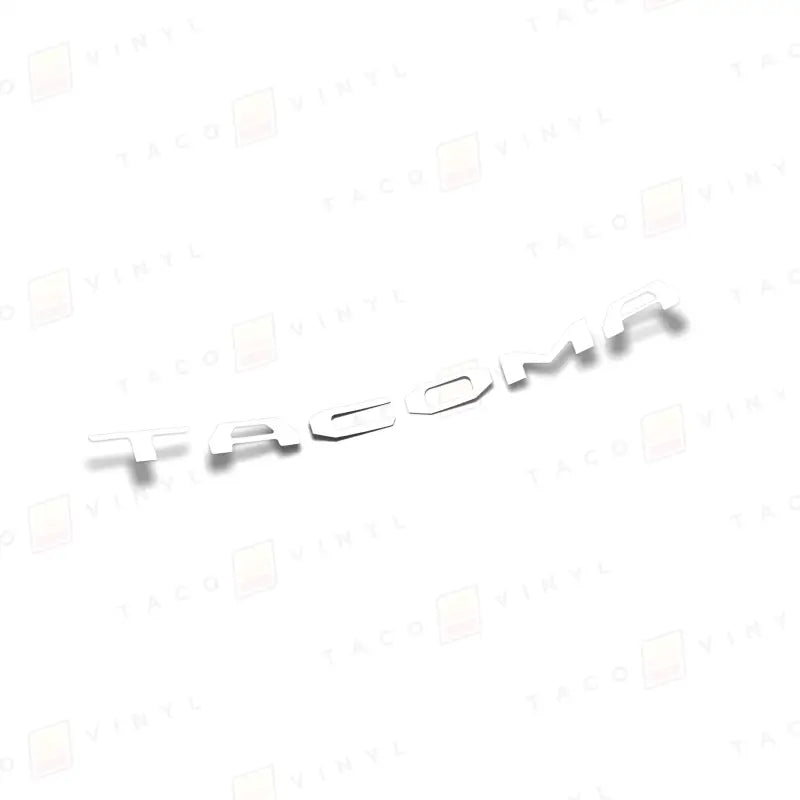 White Tacoma lettering with shadow on air release vinyl for 2024 Tacoma Tailgate