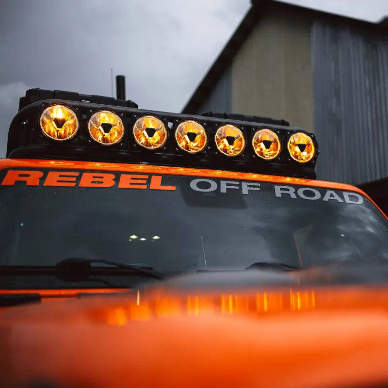 45-inch Gravity Titan LED Light Bar mounted on an off-road vehicle, emitting amber light for nighttime adventures.