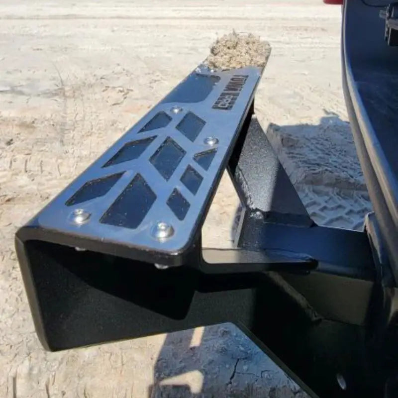 Close-up of the 4CX Boar Hitch Step with a textured skid plate, designed for heavy-duty use and a weight capacity of 770lbs, ideal for off-road vehicles.