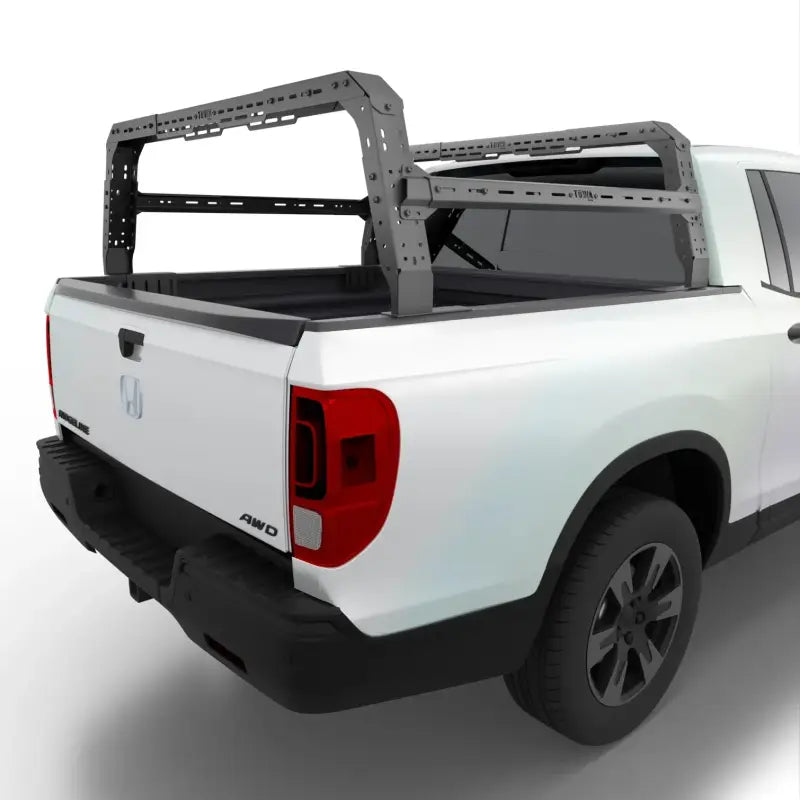 Close-up of Honda Ridgeline bed rack installed on a truck, highlighting its modular design and 800 lbs. static capacity.