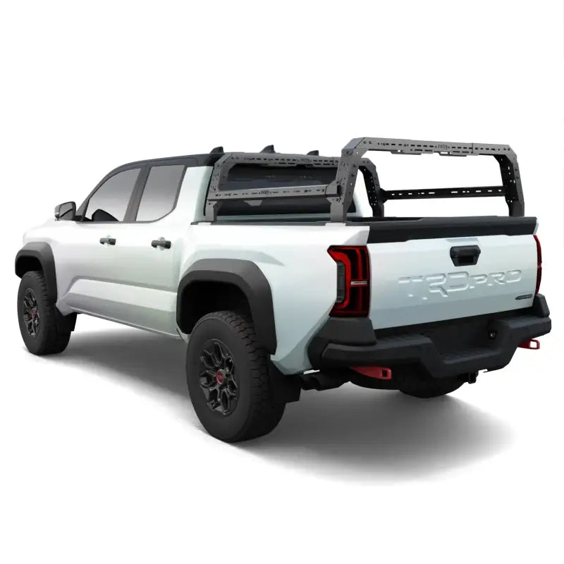 Side view of Toyota Tacoma Bed Rack on a white truck, showcasing its durable design and compatibility with overlanding and cargo needs.