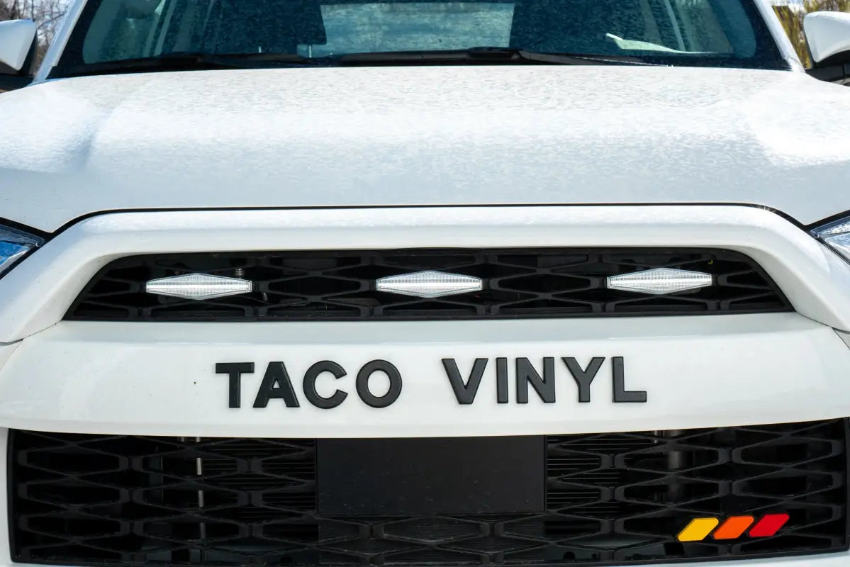 White truck grille with TACO VINYL lettering for 4Runner grille lights, quick lead time