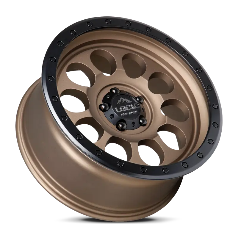 Angled view of 50CAL Desert Bronze wheel with black beadlock accents, designed for extreme conditions and off-road performance.