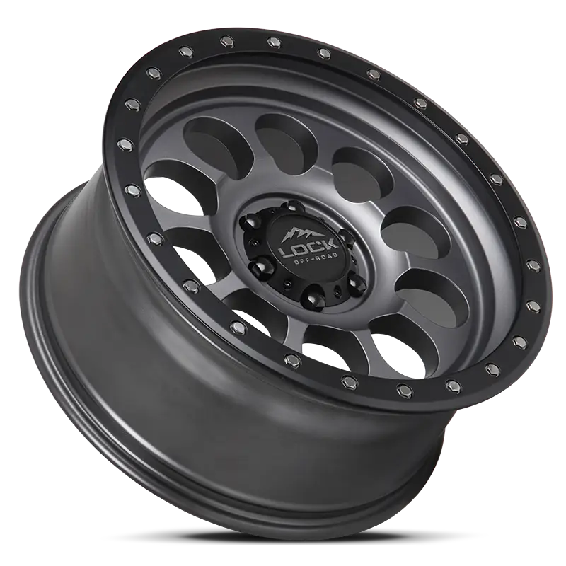 Angled view of the 50CAL Matte Grey wheel highlighting its robust construction, matte finish, and beadlock-style detailing for off-road vehicles.