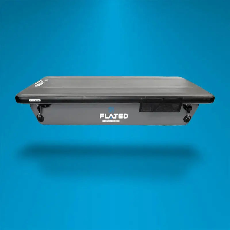 6' Cot - Portable Air-Deck floating against a blue background, highlighting its compact and inflatable design for versatile use.