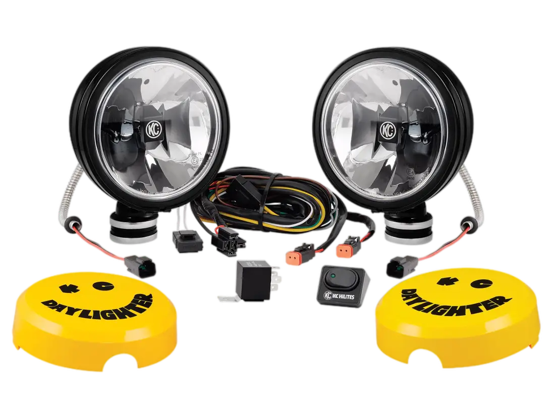6-inch Daylighter Gravity LED 2-light system with 20W driving beam, yellow protective covers, wiring harness, and mounting hardware.