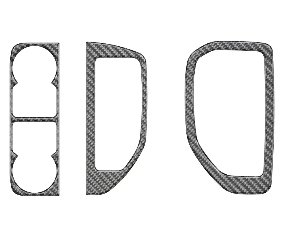 Carbon fiber interior trim with headlight control accent overlays for Chevrolet Silverado