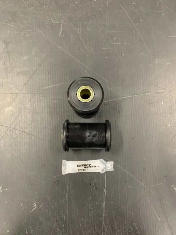 Black polyurethane poly bushings with lubricant for Tacoma and Tundra wall dom tube replacements