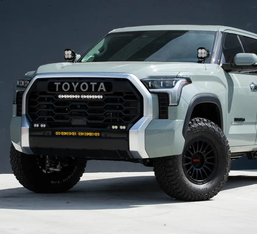 Modified gray Toyota Tundra pickup truck with Baja Designs LP4 A-Pillar Kit, clear spot replacement