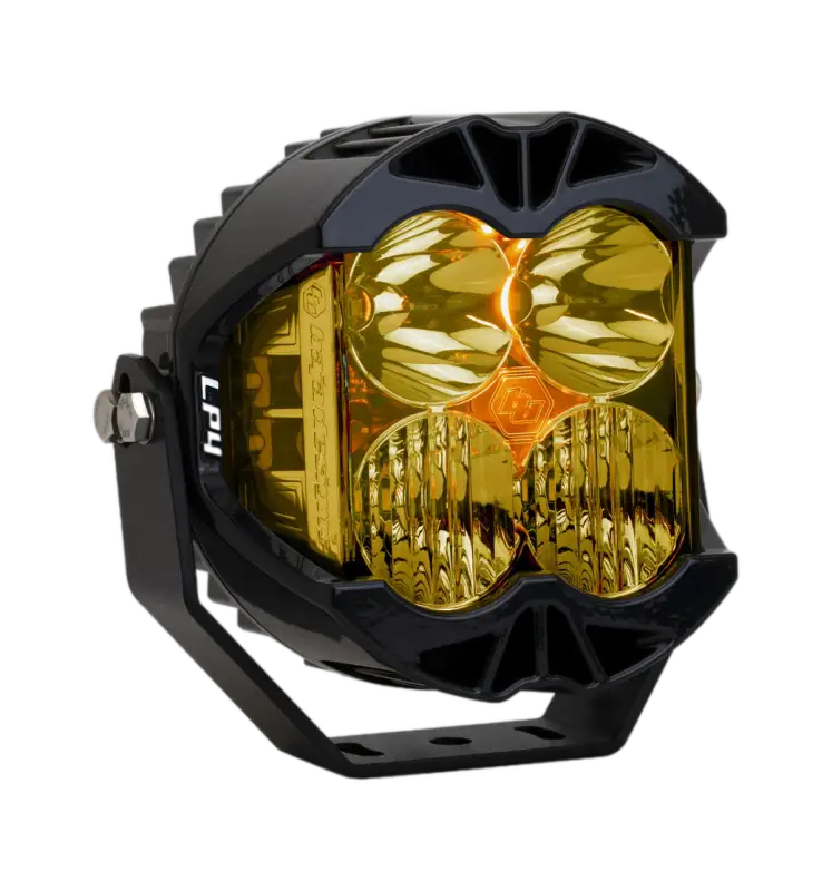 Baja Designs LP4 LED Pod Light with amber lens, compact design, customizable backlight, and advanced cooling for off-road vehicles.