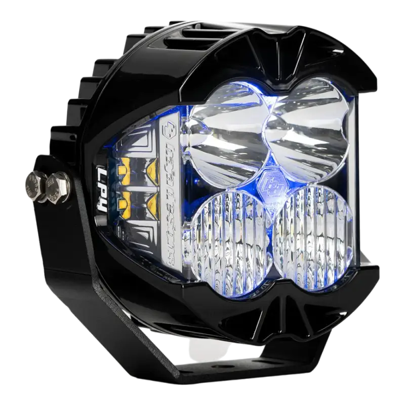 Baja Designs LP4 LED Pod Light with blue backlight, clear lens, compact design, and advanced cooling for off-road vehicles.