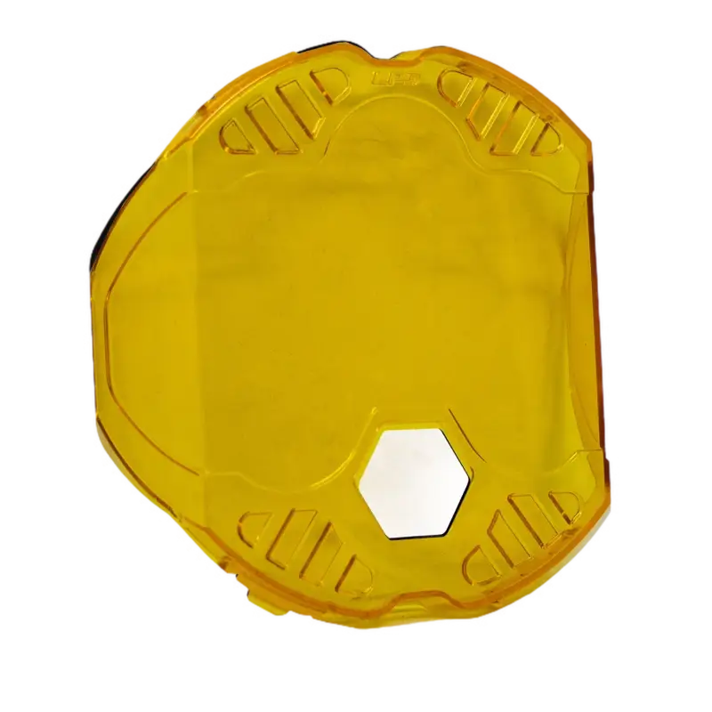 Yellow plastic lens cover with hexagonal cutout for Baja Designs LP9 Rock Guards