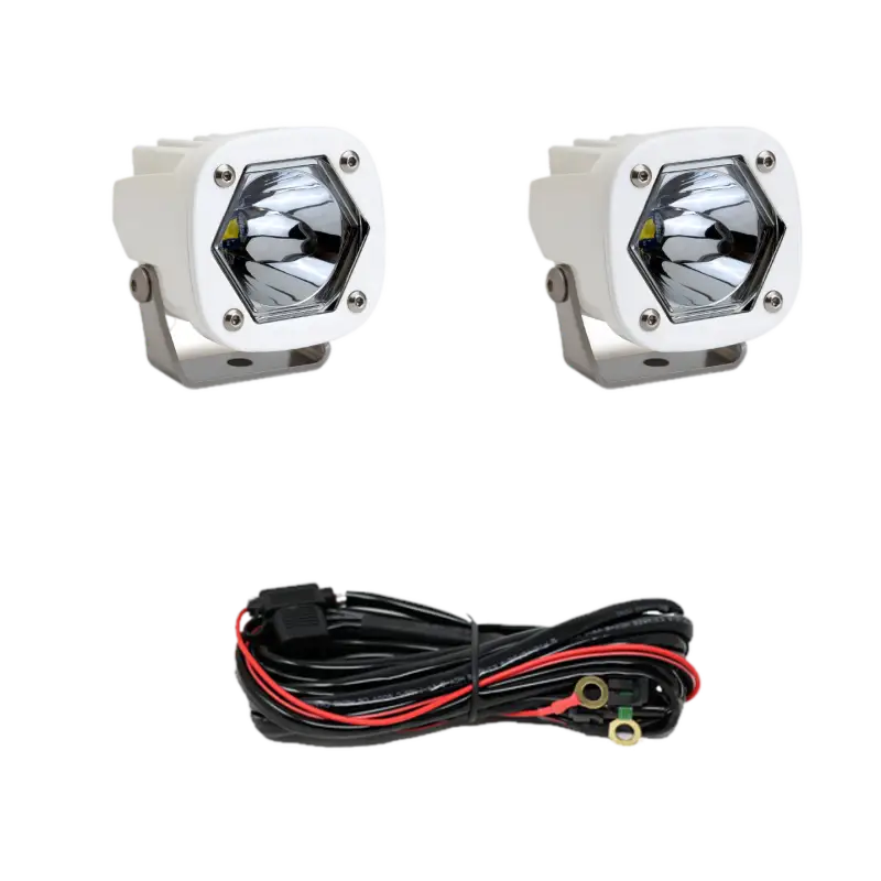 Baja Designs S1 LED Pod Lights in white with clear lens, compact and durable design, includes wiring harness for offroad lighting.