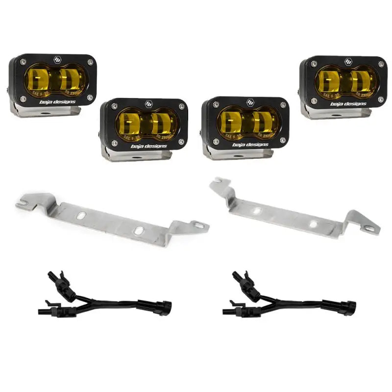 Amber lens Baja Designs S2 SAE fog light kit for 2024 Toyota Tacoma with brackets and wiring for easy installation.