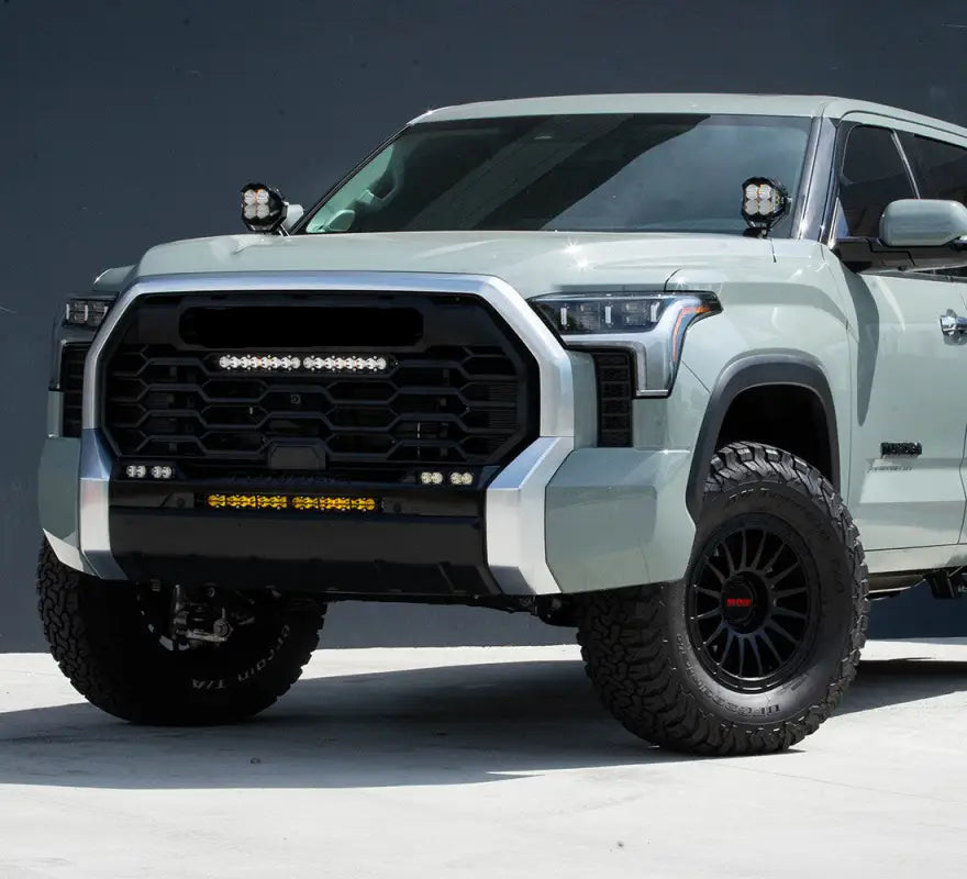 Modified light green Toyota Tundra TRD Pro with Baja Designs S8 20 inch light bar