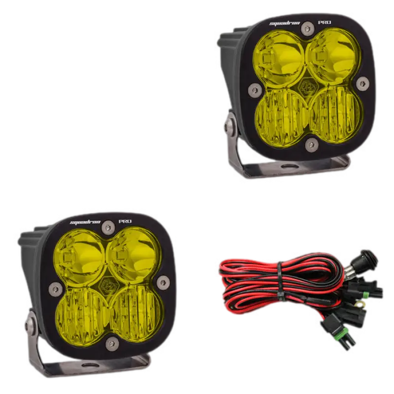 Baja Designs Squadron Pro LED light pods in black housing with amber lenses, delivering high lumens and including a wiring harness.