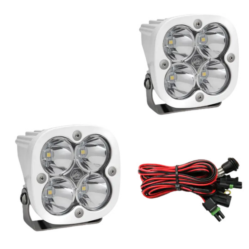 Baja Designs Squadron Pro LED light pods in white housing with clear lenses, providing high lumens and a combo beam pattern.