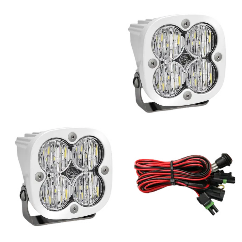 Baja Designs Squadron Pro LED light pods in white housing with clear lenses, delivering 4,600 lumens and a combo beam pattern.