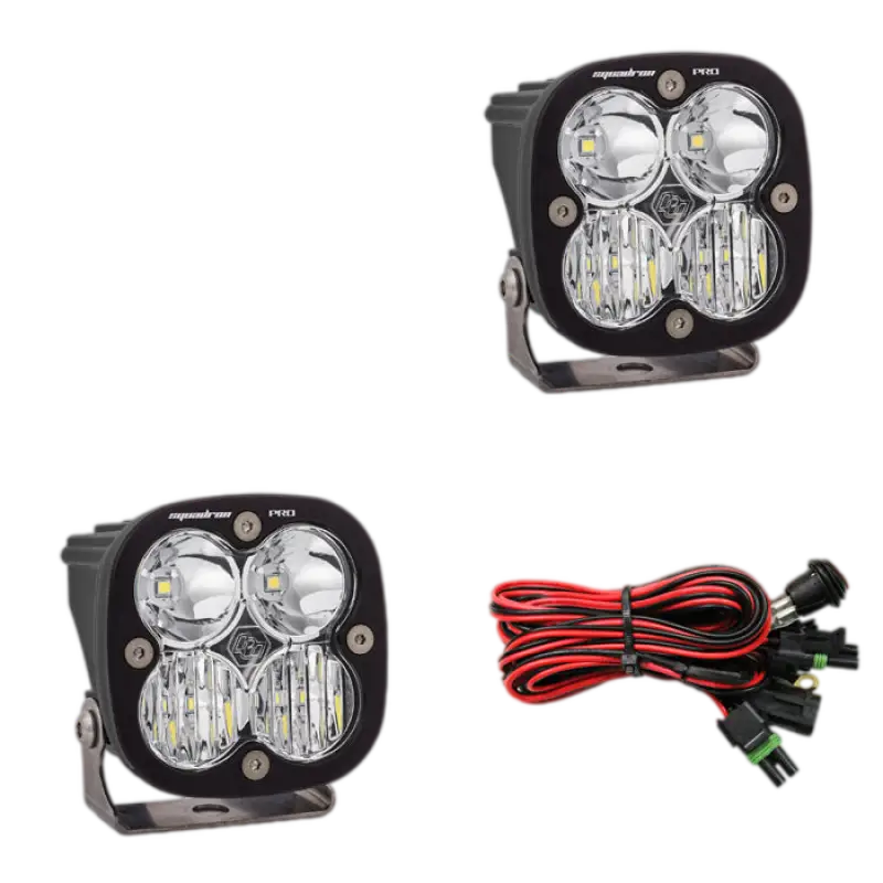 Baja Designs Squadron Pro LED light pods in black housing with clear lenses, providing 4,600 lumens and a durable wiring harness.