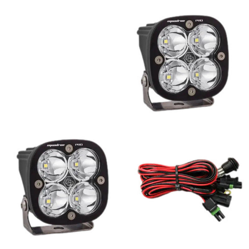 Baja Designs Squadron Pro LED light pods in black housing with clear lenses, offering high-performance lighting and wiring harness.