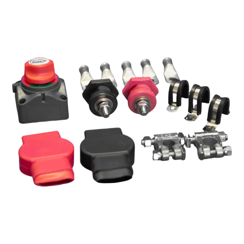 Detailed view of battery terminals, clamps, and switch included in the Toyota Tacoma battery relocate kit by JETG Designs.