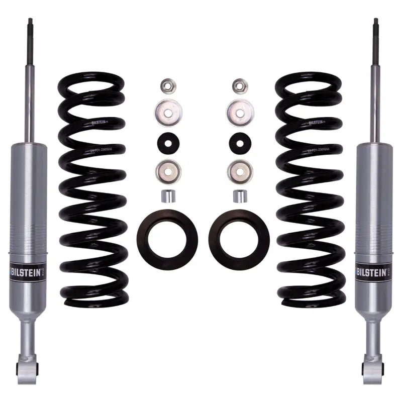 Complete Bilstein 6112 front suspension lift kit with shocks, coil springs, and mounting components for Tacoma and 4Runner models.