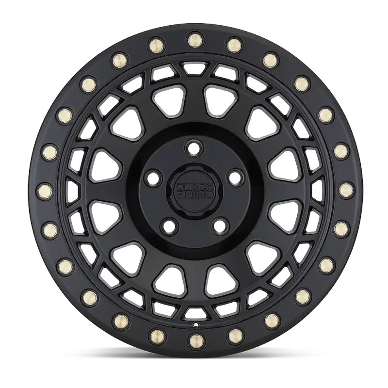 Front view of Black Rhino PRIMM matte black wheel with gold rivets, highlighting its bold and aggressive styling for trucks and SUVs.