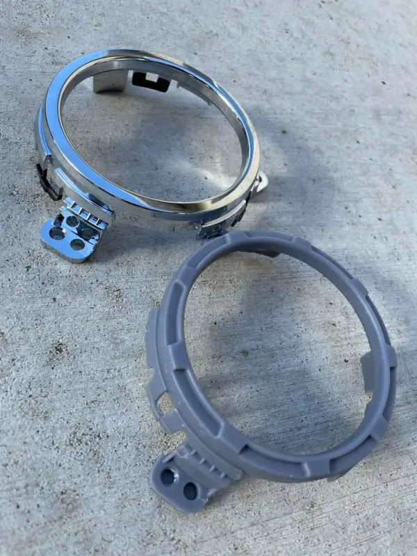 Comparison of a chrome vent ring and a gray vent ring, highlighting the replacement options for Tundra interior upgrades.