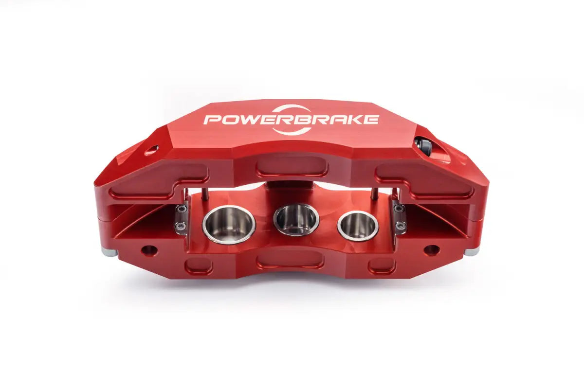Front view of red PowerBrake 6-piston caliper, showcasing piston arrangement for 4Runner Big Brake Kit 03-09.