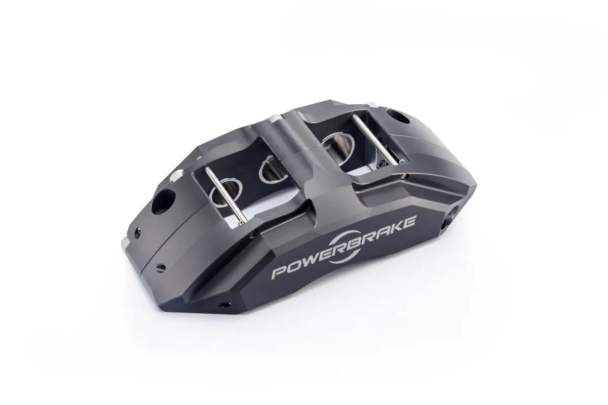 PowerBrake 6 piston caliper in grey finish with visible branding and high-performance design.