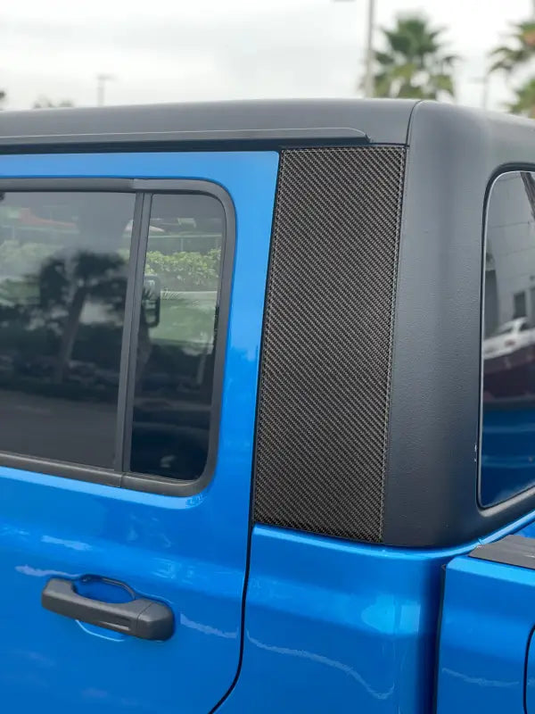 Blue pickup truck with carbon fiber pillar accent overlays for Jeep Gladiator 2019-2024