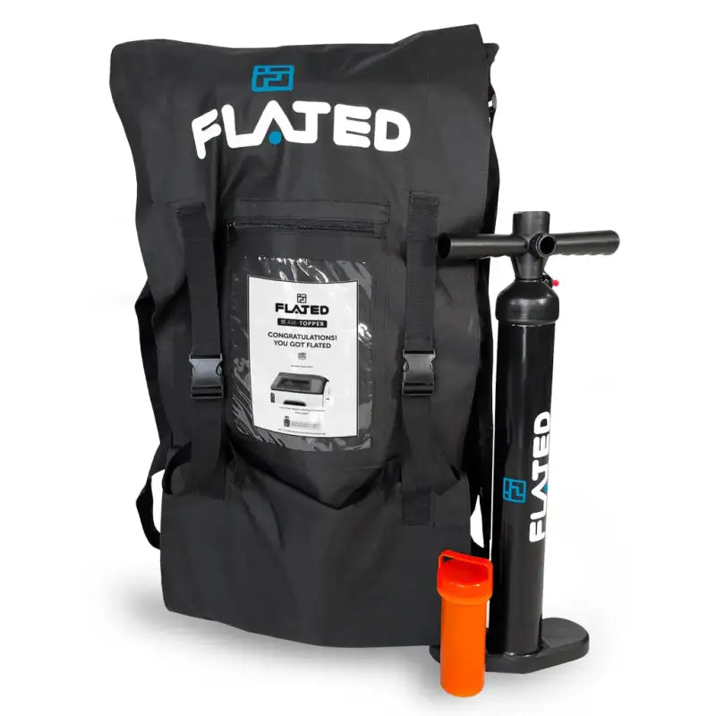 Flated Air-Topper kit bag with included manual, pump, and accessories for easy setup and portability of the Jeep Gladiator truck cap.