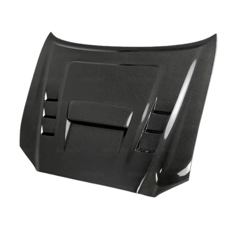 TS-Style carbon fiber hood for Toyota Tacoma (2016-2021) with a glossy finish and aerodynamic vents. Durable and lightweight for enhanced performance.