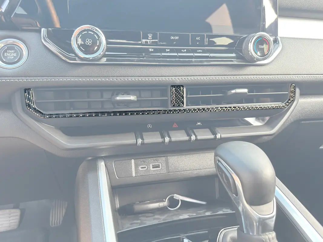 Car dashboard interior with vent accent overlay for Chevrolet Colorado and GMC Canyon
