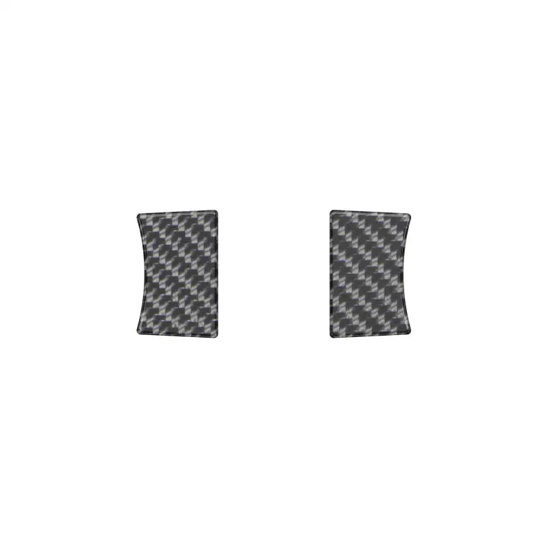 Two carbon fiber textured center console cup holder divider overlays designed for 2016-2023 Toyota Tacoma models.
