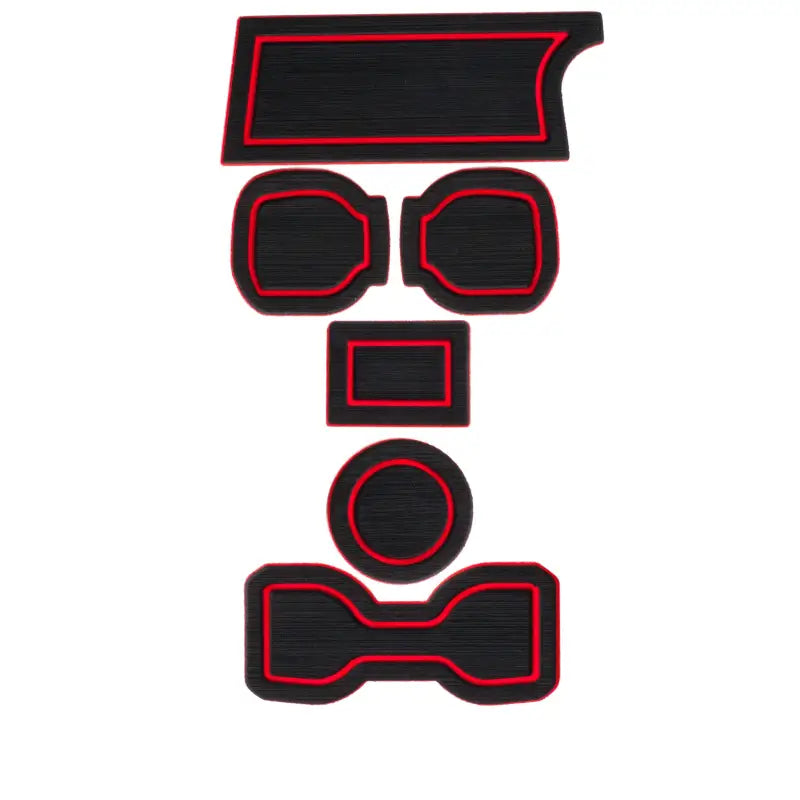 Set of black foam cup holder inserts with red trim designed for 2016-2023 Toyota Tacoma, shown in a flat layout for easy identification.