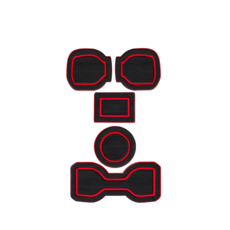 Black and red foam cup holder inserts for Toyota Tacoma 2016-2023, displayed in a flat arrangement for detailed view of each piece.