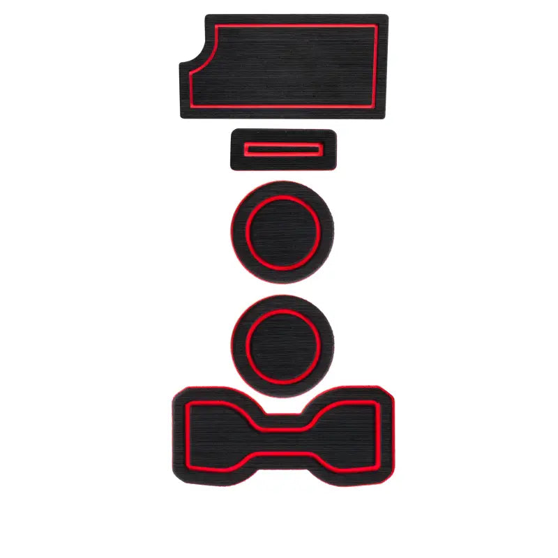 Custom-fit black and red foam inserts for Toyota Tacoma center console, compatible with 2016-2023 models, displayed in a flat layout.