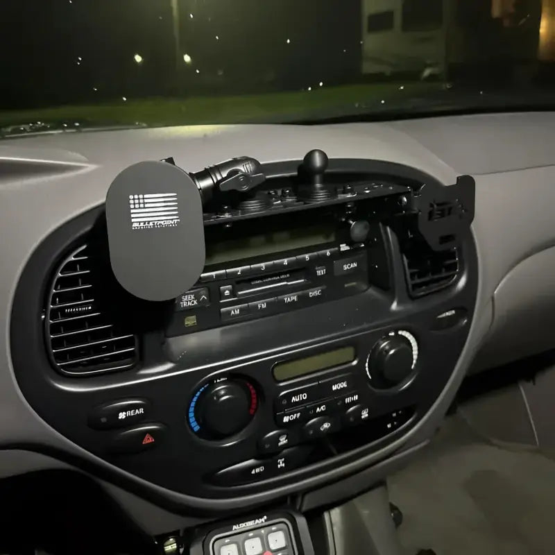 1st Gen Sequoia dash modular accessory mount installed with phone holder and American flag design. Fits 2001-2007 models.