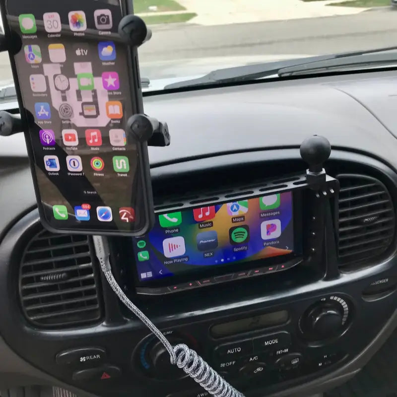 Sequoia dash mount holding a phone and displaying CarPlay interface. Customizable for 2001-2007 models.