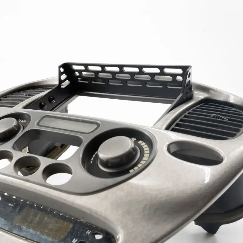 Sequoia dash accessory mount with black metal construction and multiple mounting slots. Fits 2001-2007 models.