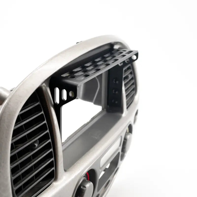 Close-up of Sequoia dash modular accessory mount with black metal construction and multiple mounting holes for customization.