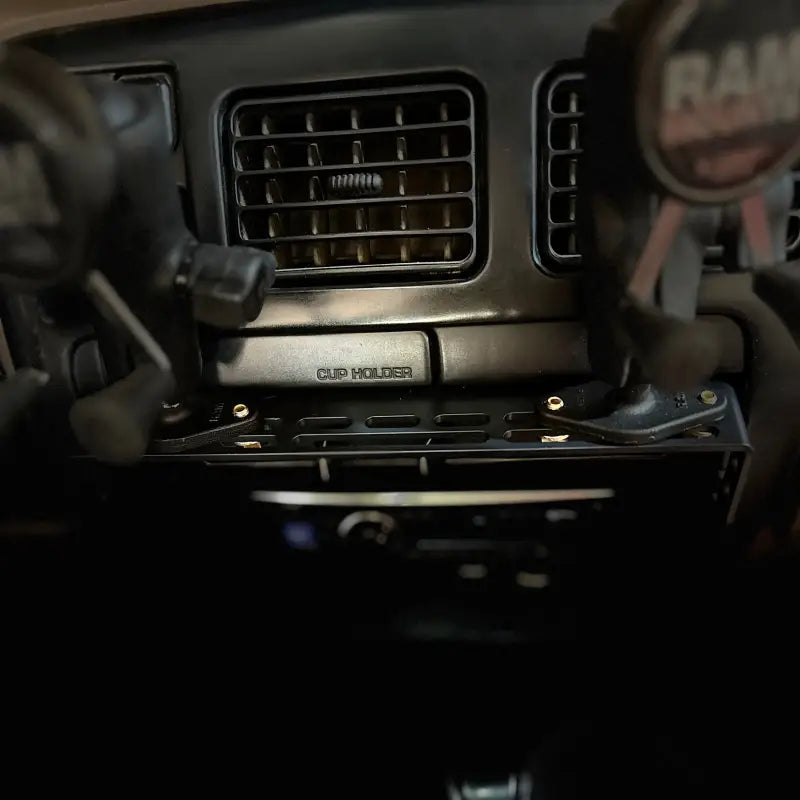 Close-up of the 3rd Gen 4Runner console mount with dual RAM mounts, emphasizing its robust and modular design.