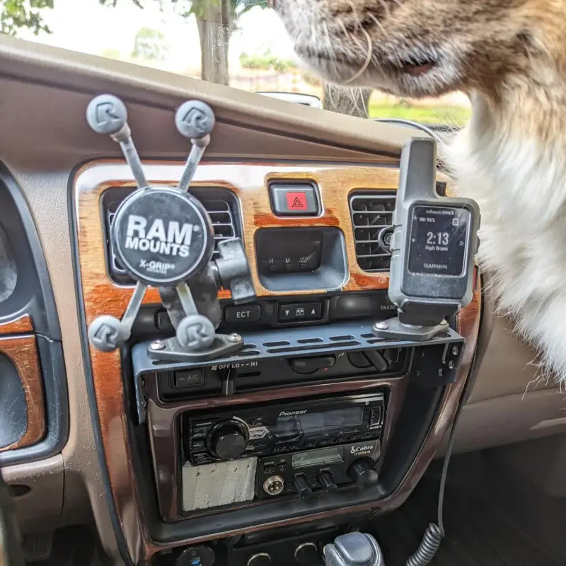 3rd Gen 4Runner console mount with RAM mounts and a Garmin GPS, showcasing its versatility for off-road adventures.