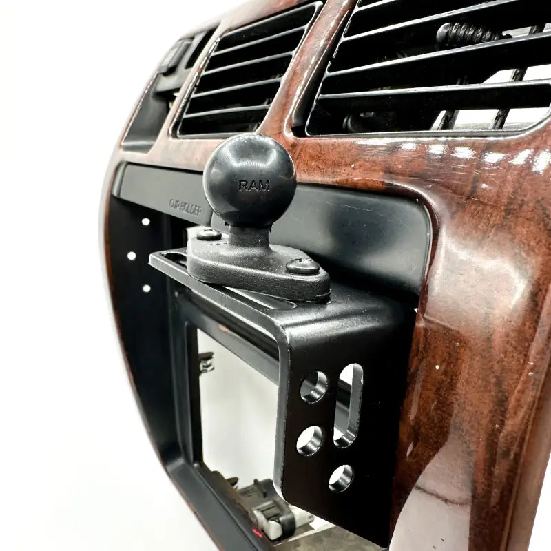 3rd Gen 4Runner console mount with a RAM mount installed, emphasizing its compatibility with various accessories.